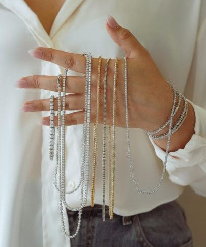 Various strands of lab grown diamond necklaces.